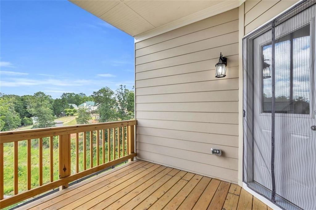 2340 Manor Pointe Drive Cumming, GA 30041 - Photo 16 of 45 a view of a balcony with wooden floor