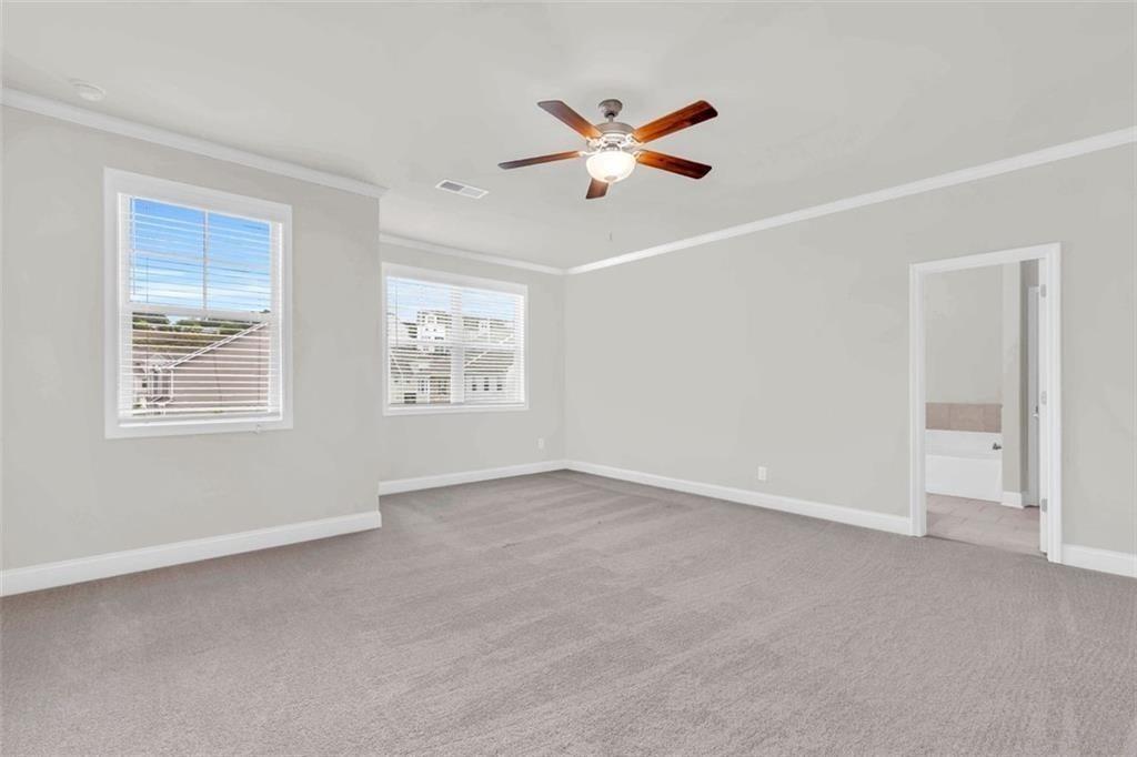 2340 Manor Pointe Drive Cumming, GA 30041 - Photo 19 of 45 a view of an empty room with a window