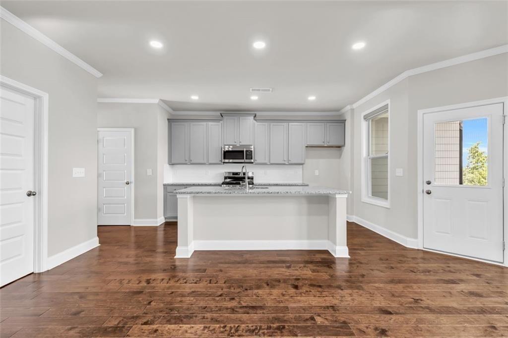 2340 Manor Pointe Drive Cumming, GA 30041 - Photo 10 of 45 a view of kitchen with wooden floor