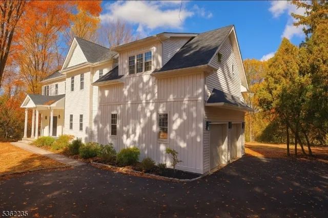 a view of a street with a building in the background