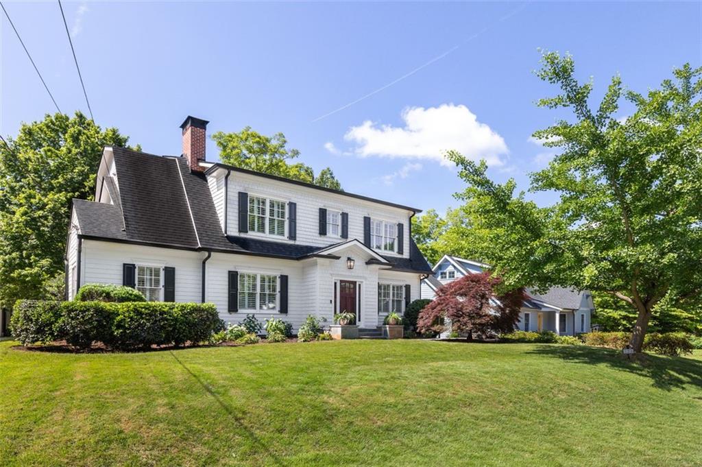 128 Vidal Boulevard Decatur, GA 30030 - Photo 1 of 1 a front view of a house with a garden