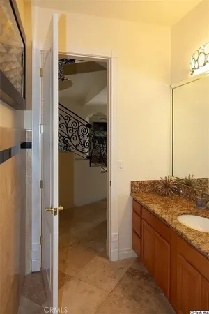 a bathroom with a bathtub and a window