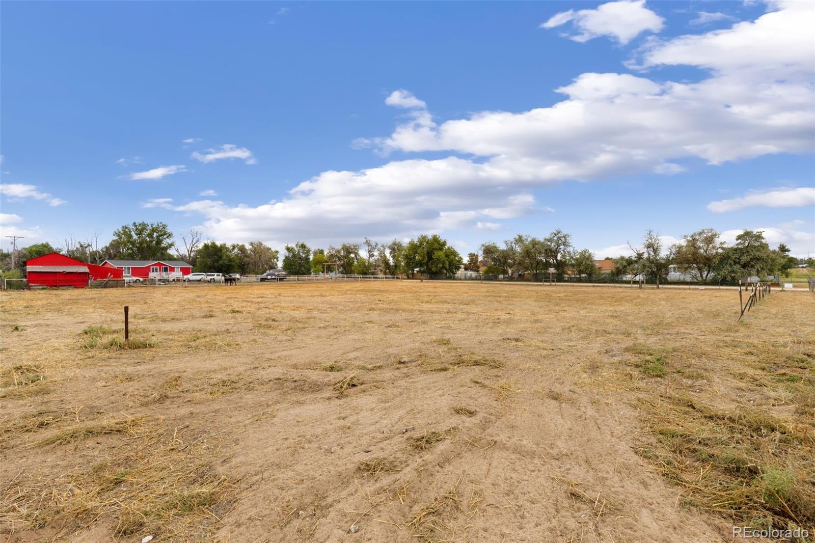 Morris Avenue Fort Lupton, CO 80621 - Photo 8 of 9 a view of an ocean with a beach