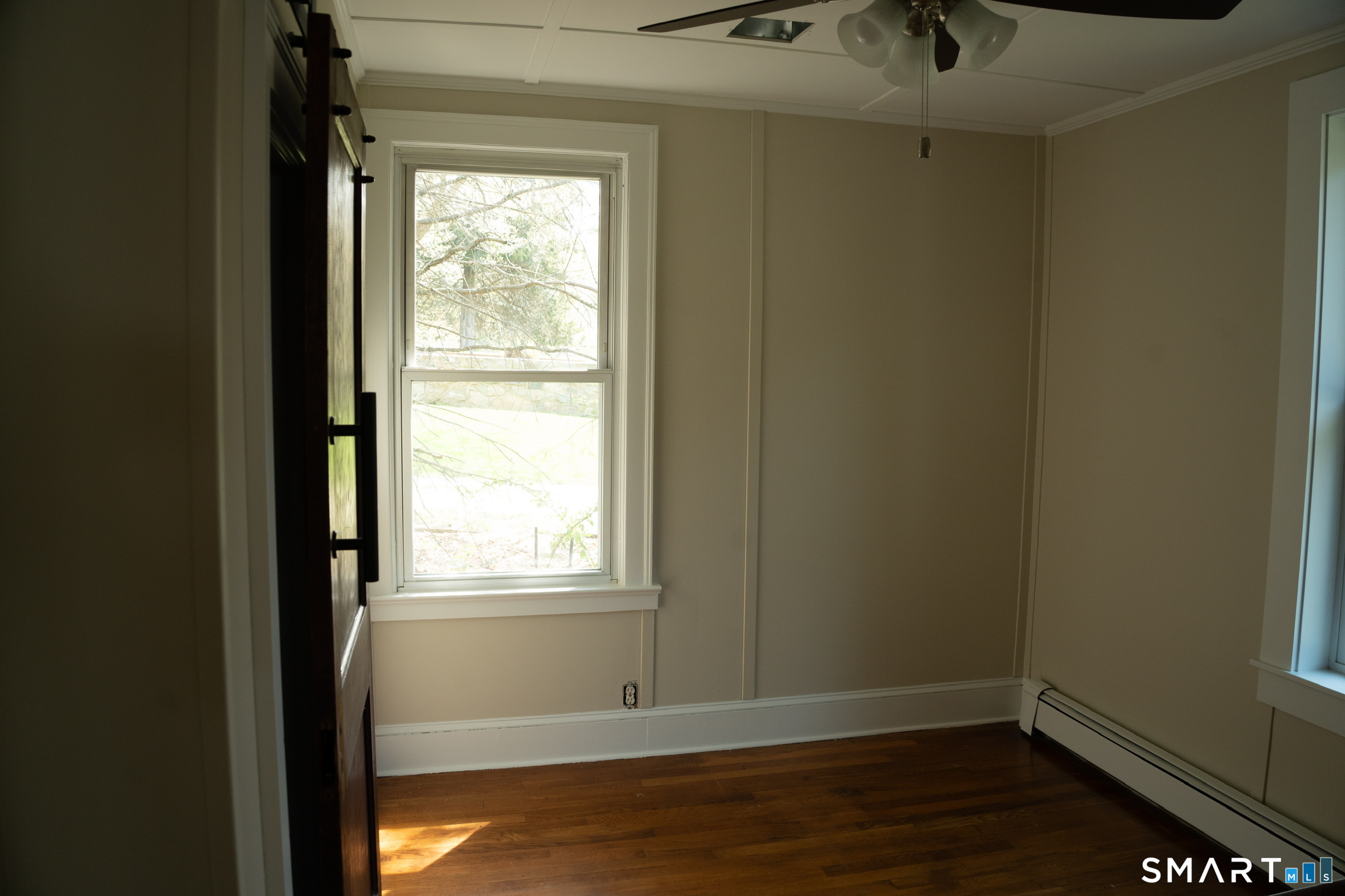 97 Candlewood Road Groton, CT 06340 - Photo 14 of 26 a view of an empty room and window