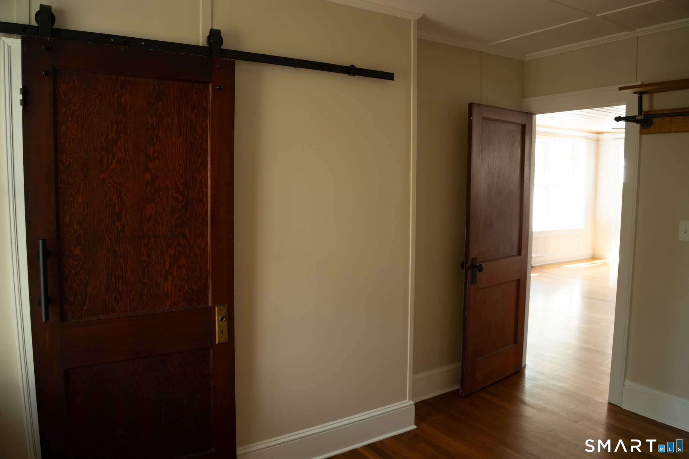 97 Candlewood Road Groton, CT 06340 - Photo 16 of 26 a view of front door with wooden floor