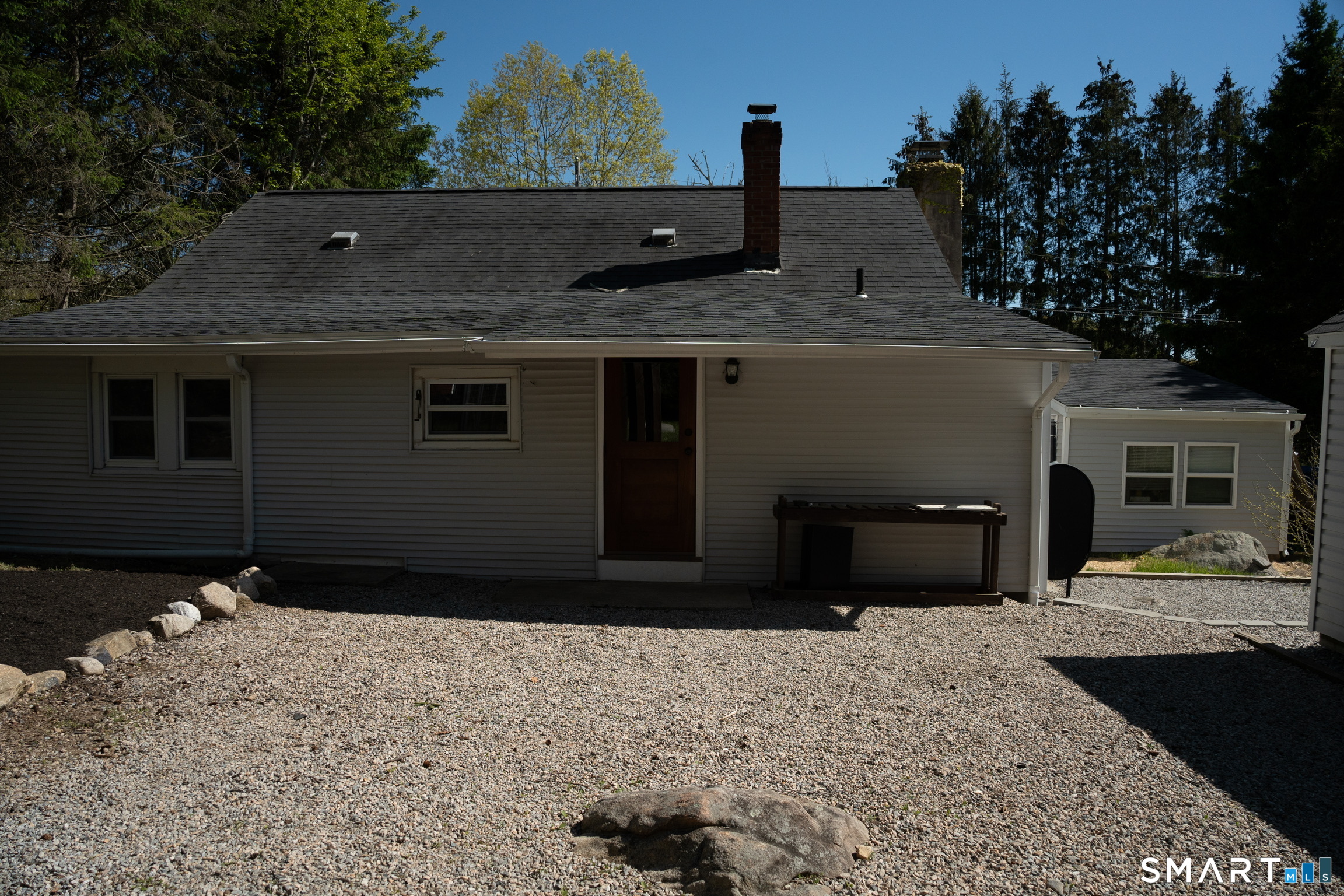 97 Candlewood Road Groton, CT 06340 - Photo 22 of 26 a front view of a house with a yard