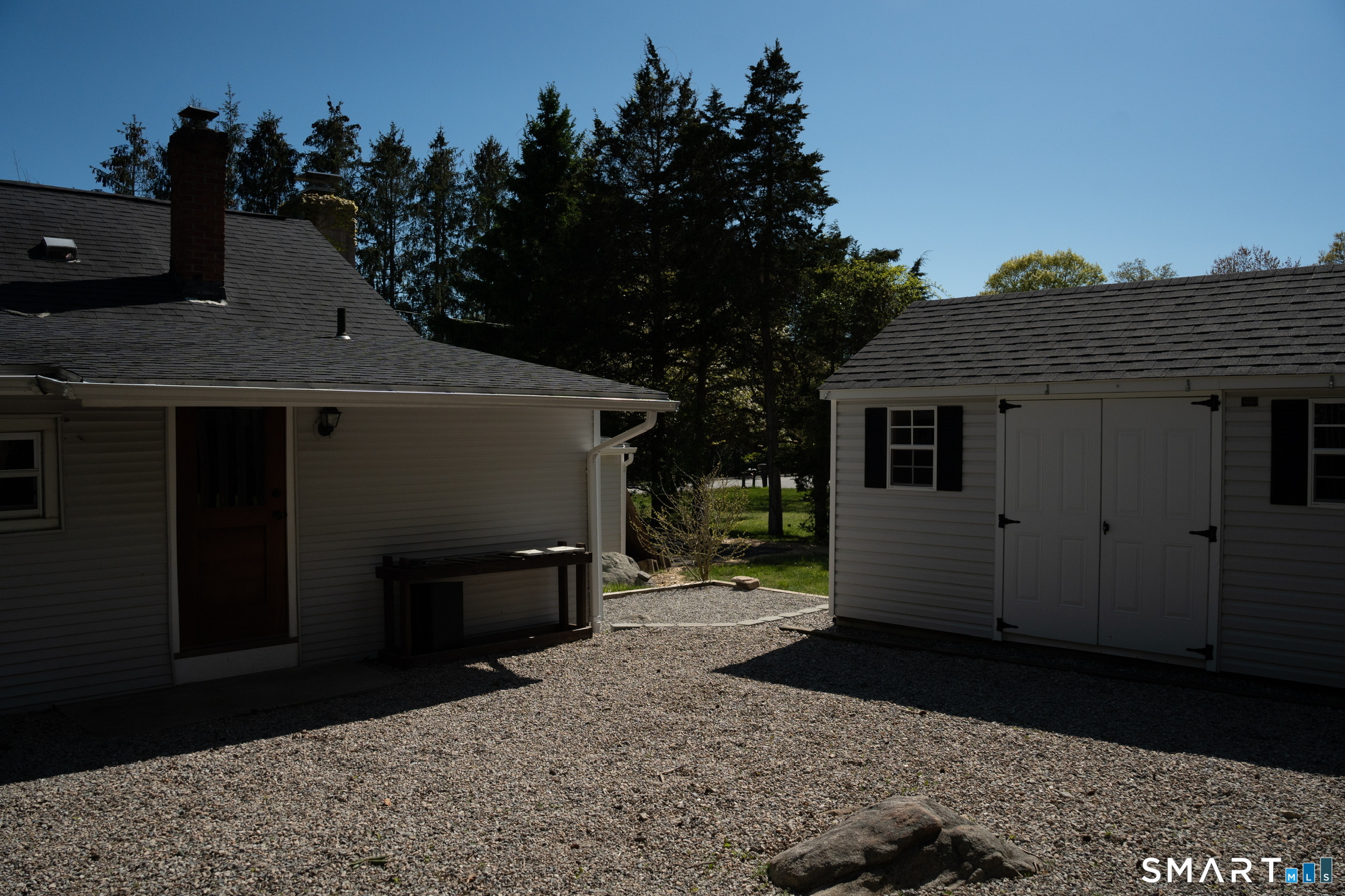 97 Candlewood Road Groton, CT 06340 - Photo 23 of 26 a view of a house with a backyard
