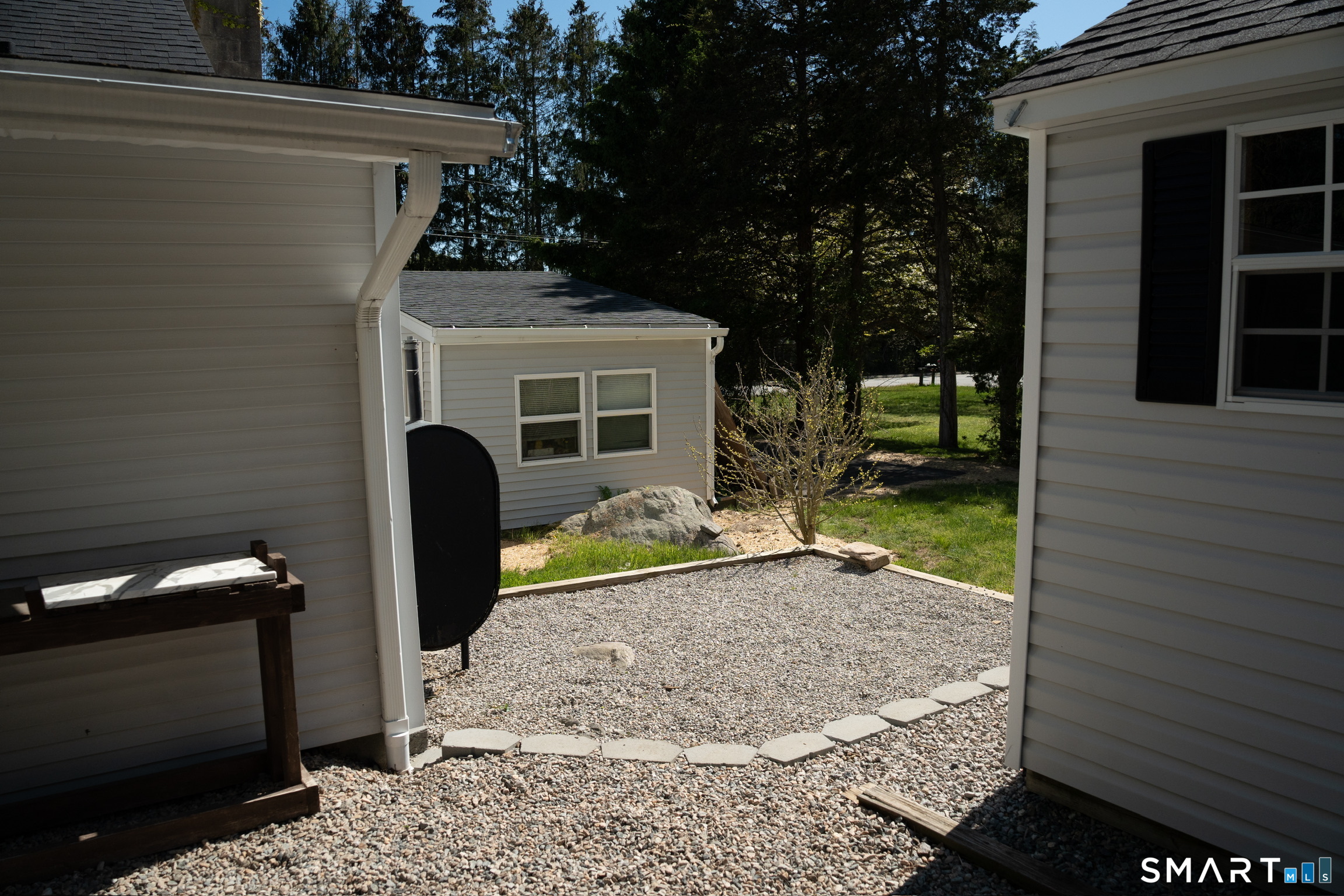 97 Candlewood Road Groton, CT 06340 - Photo 25 of 26 a view of a house with a sink and yard