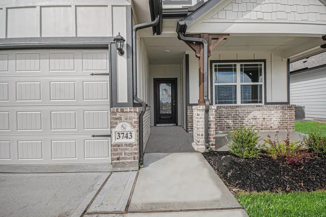 a front view of a house with entryway