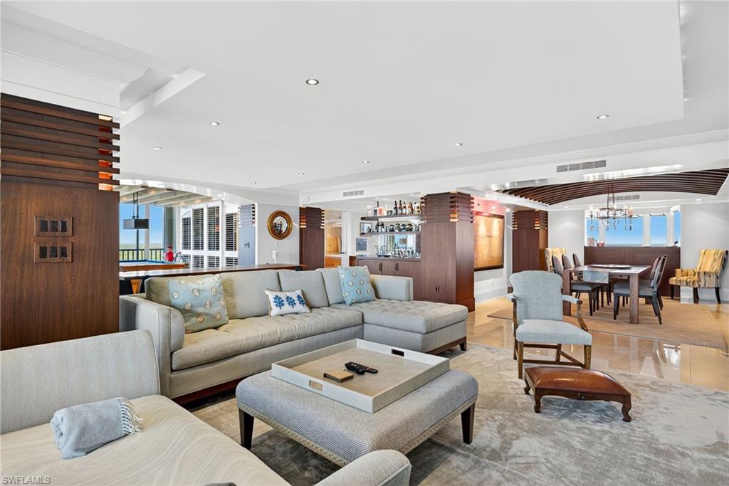 5601 Turtle Bay Drive, Unit 2104 Naples, FL 34108 - Photo 5 of 31 Living area featuring tile patterned floors, billiards table, a chandelier, and recessed lighting