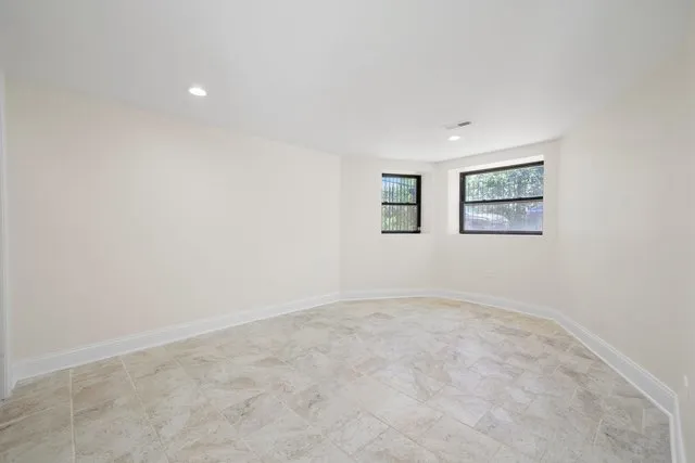 an empty room with windows