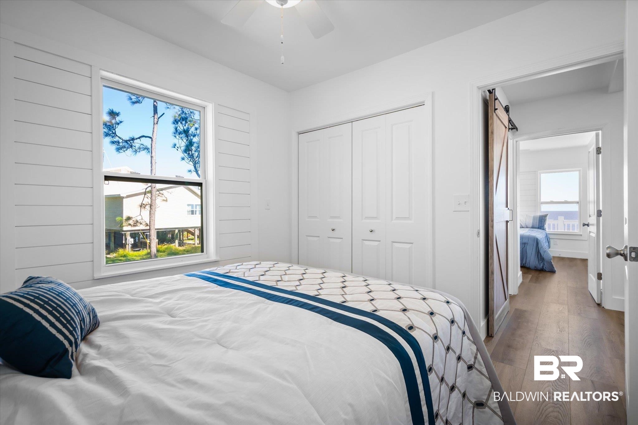 15111 Regus Road Coden, AL 36523 - Photo 15 of 35 Bedroom featuring hardwood / wood-style flooring, a closet, and ceiling fan
