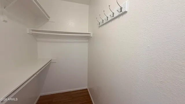 a bathroom with a sink a mirror and vanity