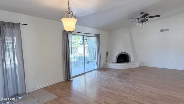 a kitchen with a stove a sink and a microwave