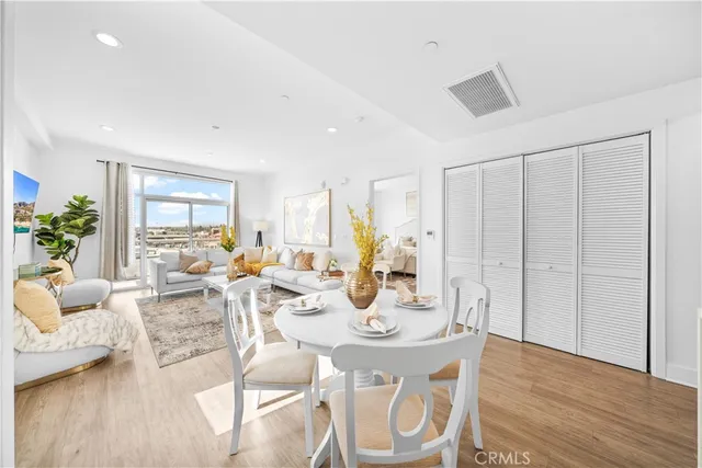 a living room with furniture or couch and a large window