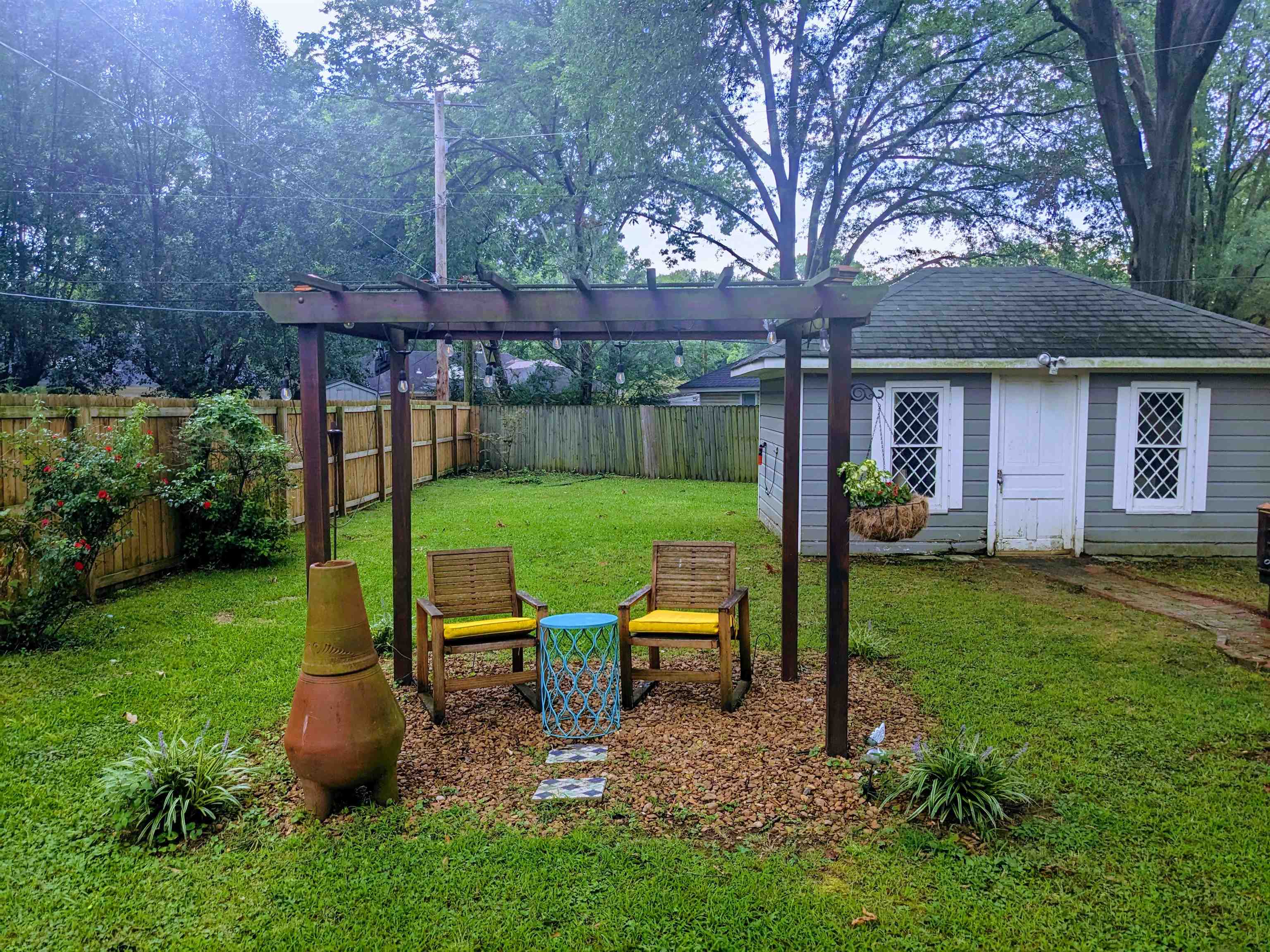 5041 Quince Road Memphis, TN 38117 - Photo 27 of 28 a view of a wooden bench sitting in backyard of house