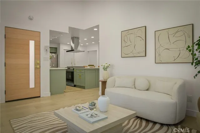 a living room with furniture and a rug