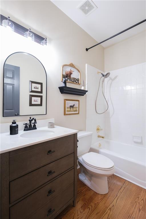 4330 Farmbrook Lane Cumming, GA 30041 - Photo 18 of 46 a bathroom with a toilet a sink and mirror
