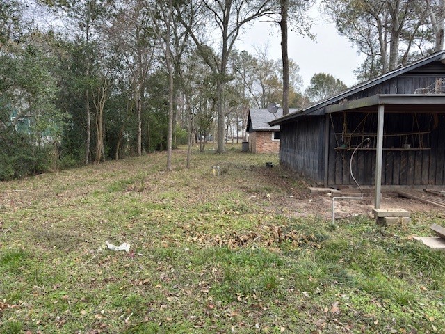2022 Pecan Lane Katy, TX 77494 - Photo 7 of 8 a backyard of a house with lots of green space
