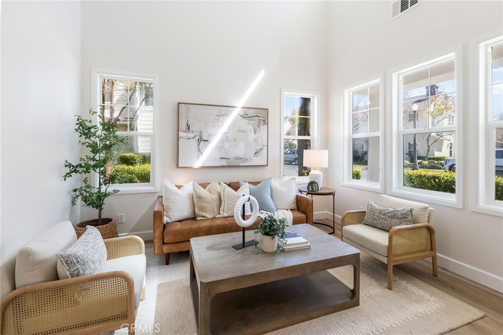 1 Tarleton Lane Ladera Ranch, CA 92694 - Photo 12 of 58 a living room with furniture and a potted plant