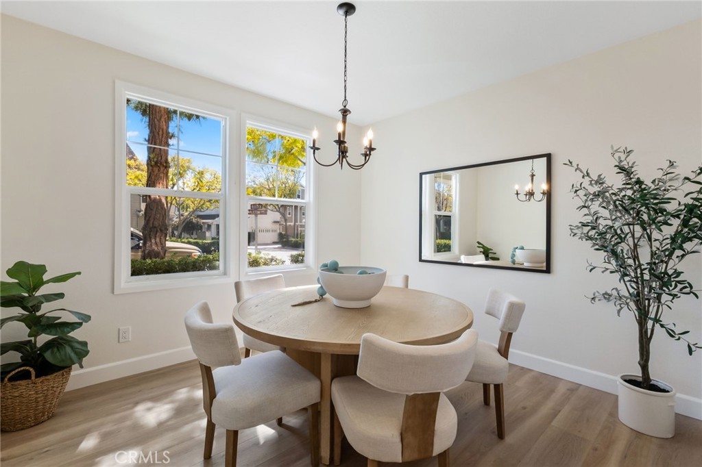 1 Tarleton Lane Ladera Ranch, CA 92694 - Photo 23 of 58 a view of a dining room with furniture window and wooden floor