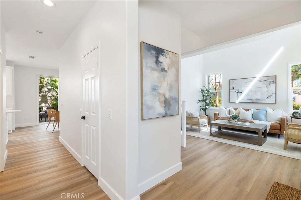 1 Tarleton Lane Ladera Ranch, CA 92694 - Photo 25 of 58 a living room with furniture and a wooden floor