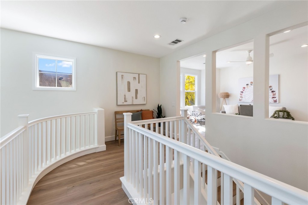1 Tarleton Lane Ladera Ranch, CA 92694 - Photo 28 of 58 a living room with furniture and a wooden floor