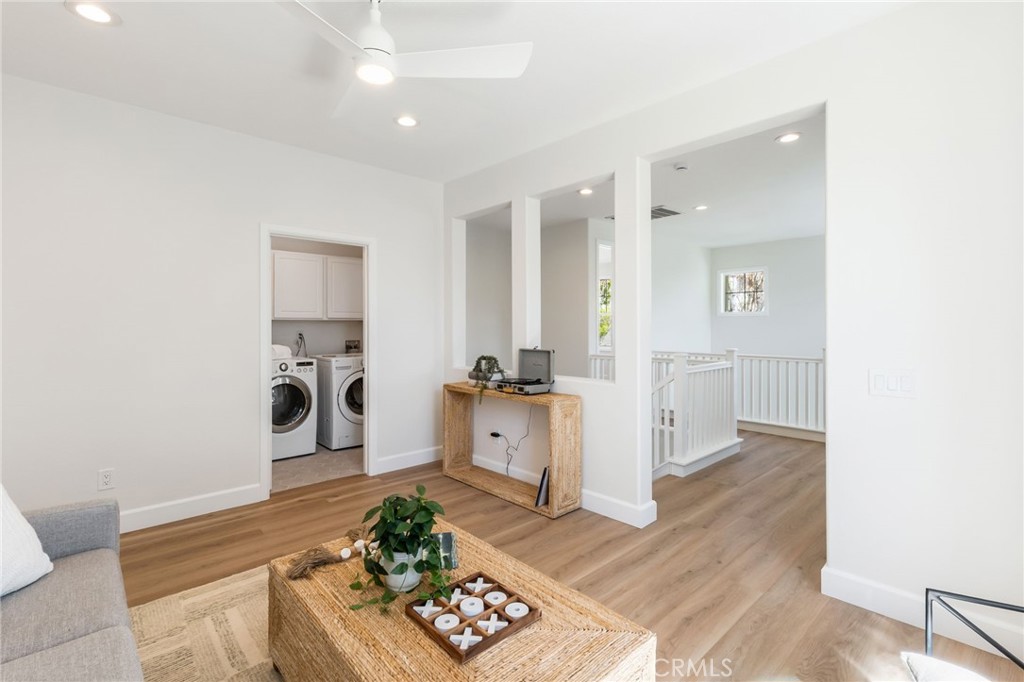 1 Tarleton Lane Ladera Ranch, CA 92694 - Photo 30 of 58 a large white kitchen with stainless steel appliances granite countertop a refrigerator and a stove