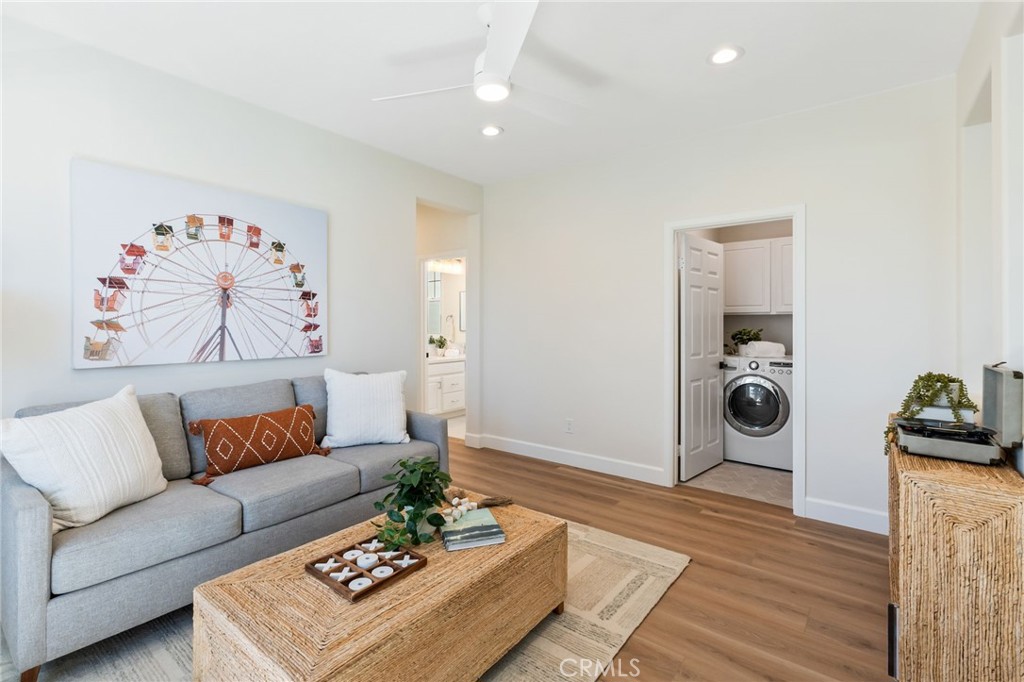1 Tarleton Lane Ladera Ranch, CA 92694 - Photo 31 of 58 a living room with furniture and wooden floor
