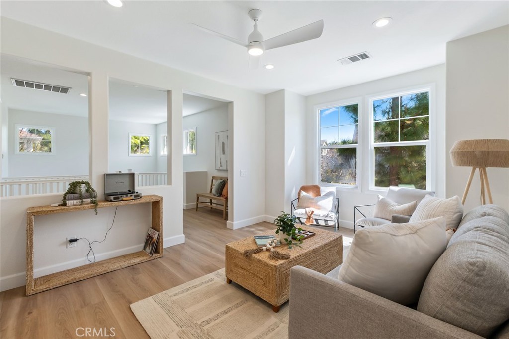 1 Tarleton Lane Ladera Ranch, CA 92694 - Photo 32 of 58 a living room with furniture and a large window