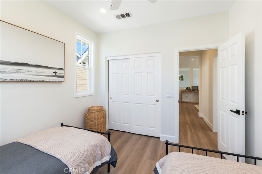 1 Tarleton Lane Ladera Ranch, CA 92694 - Photo 36 of 58 a bedroom with a bed and wooden floor