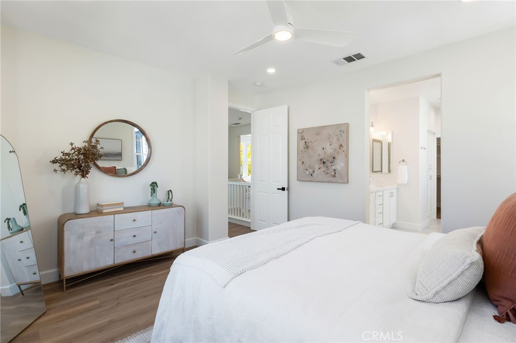 1 Tarleton Lane Ladera Ranch, CA 92694 - Photo 44 of 58 a bedroom with bed and a large mirror