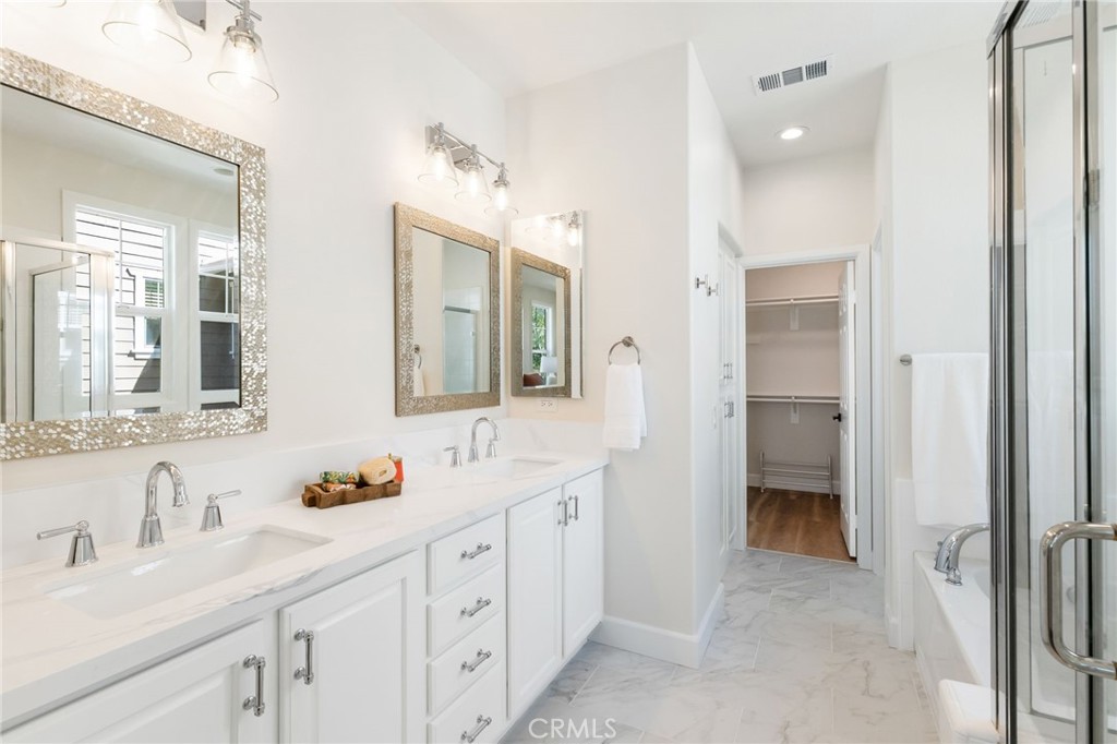 1 Tarleton Lane Ladera Ranch, CA 92694 - Photo 46 of 58 a spacious bathroom with a double vanity sink mirror and double