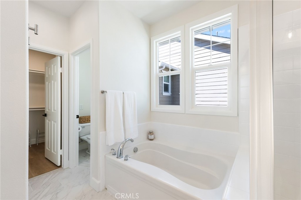 1 Tarleton Lane Ladera Ranch, CA 92694 - Photo 49 of 58 a bathroom with a bathtub and a shower