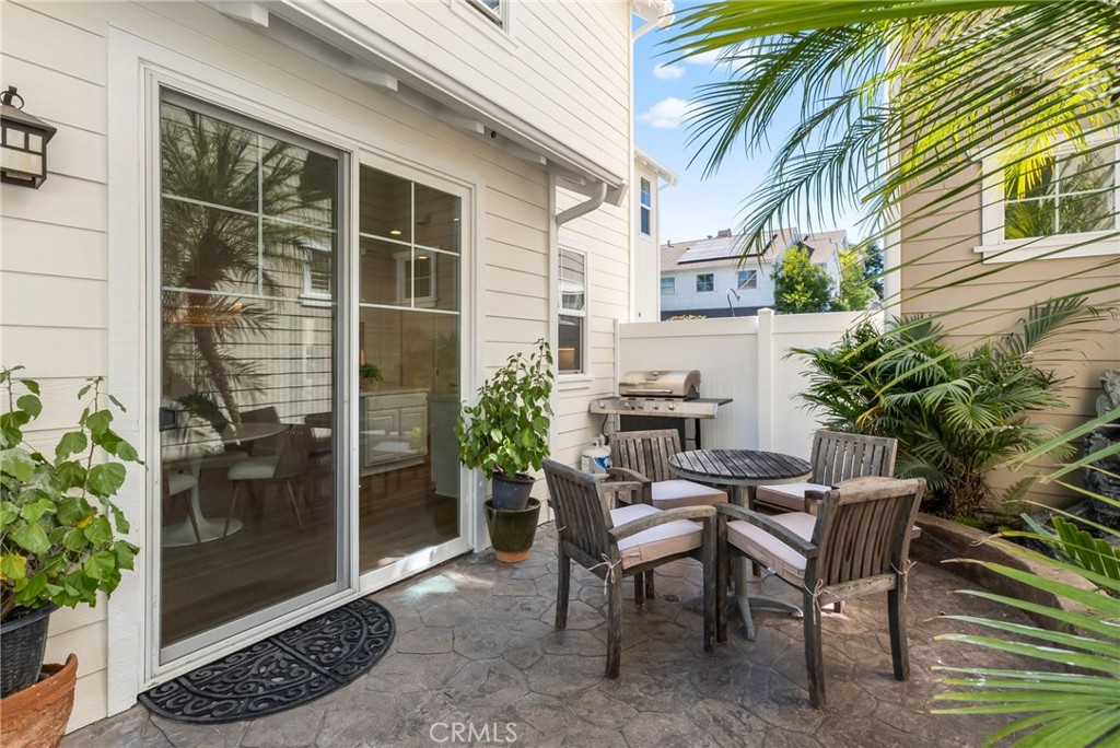 1 Tarleton Lane Ladera Ranch, CA 92694 - Photo 52 of 58 a view of a patio with table and chairs and potted plants