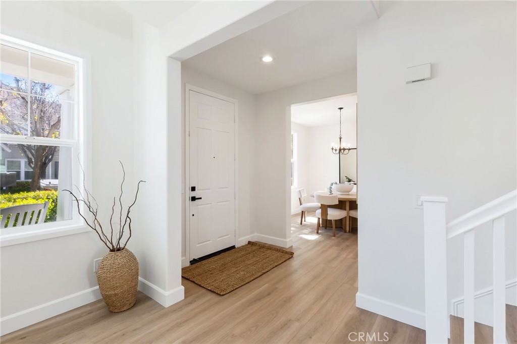1 Tarleton Lane Ladera Ranch, CA 92694 - Photo 8 of 58 a living room with furniture and wooden floor