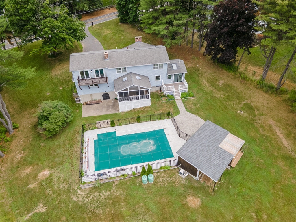 124 Everett Street Natick, MA 01760 - Photo 32 of 36 an aerial view of a house with garden space and street view