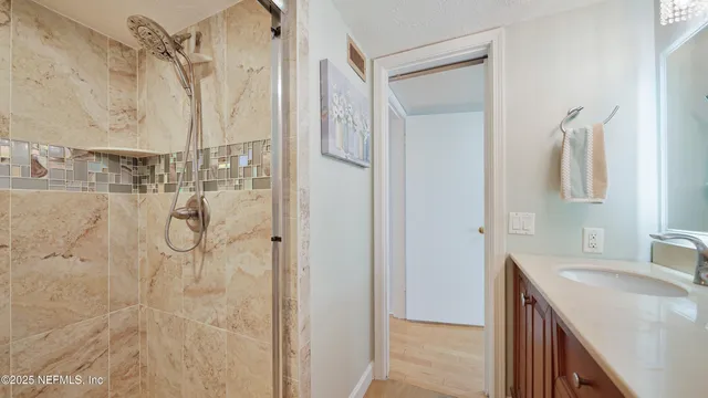 a view of a chairs and table in patio