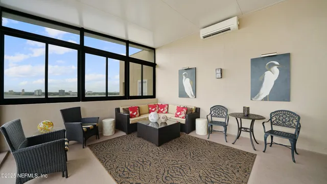 a view of a balcony with chairs