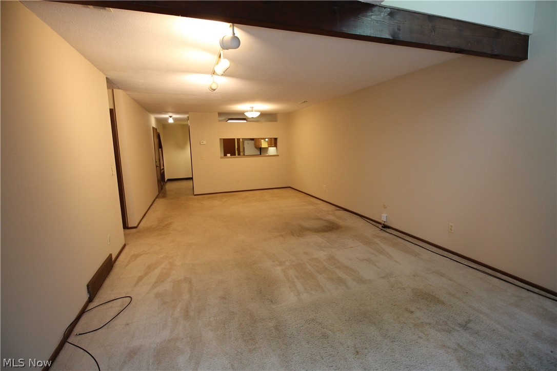 4695 Mayfield Road, Unit D South Euclid, OH 44121 - Photo 8 of 22 Living Room as you enter from patio that flows into Dining Room and Kitchen beyond.