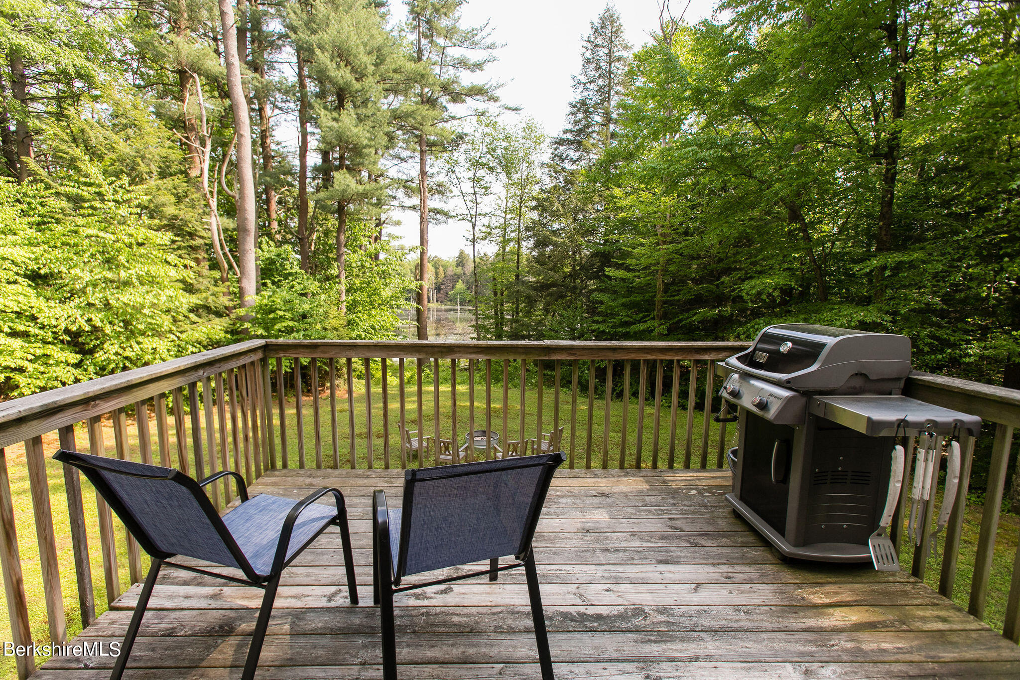707 Dimmock Road Otis, MA 01253 - Photo 25 of 31 a view of a chairs on the deck