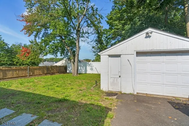 a view of a backyard of the house