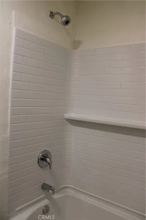 a close view of a utility room with cabinet