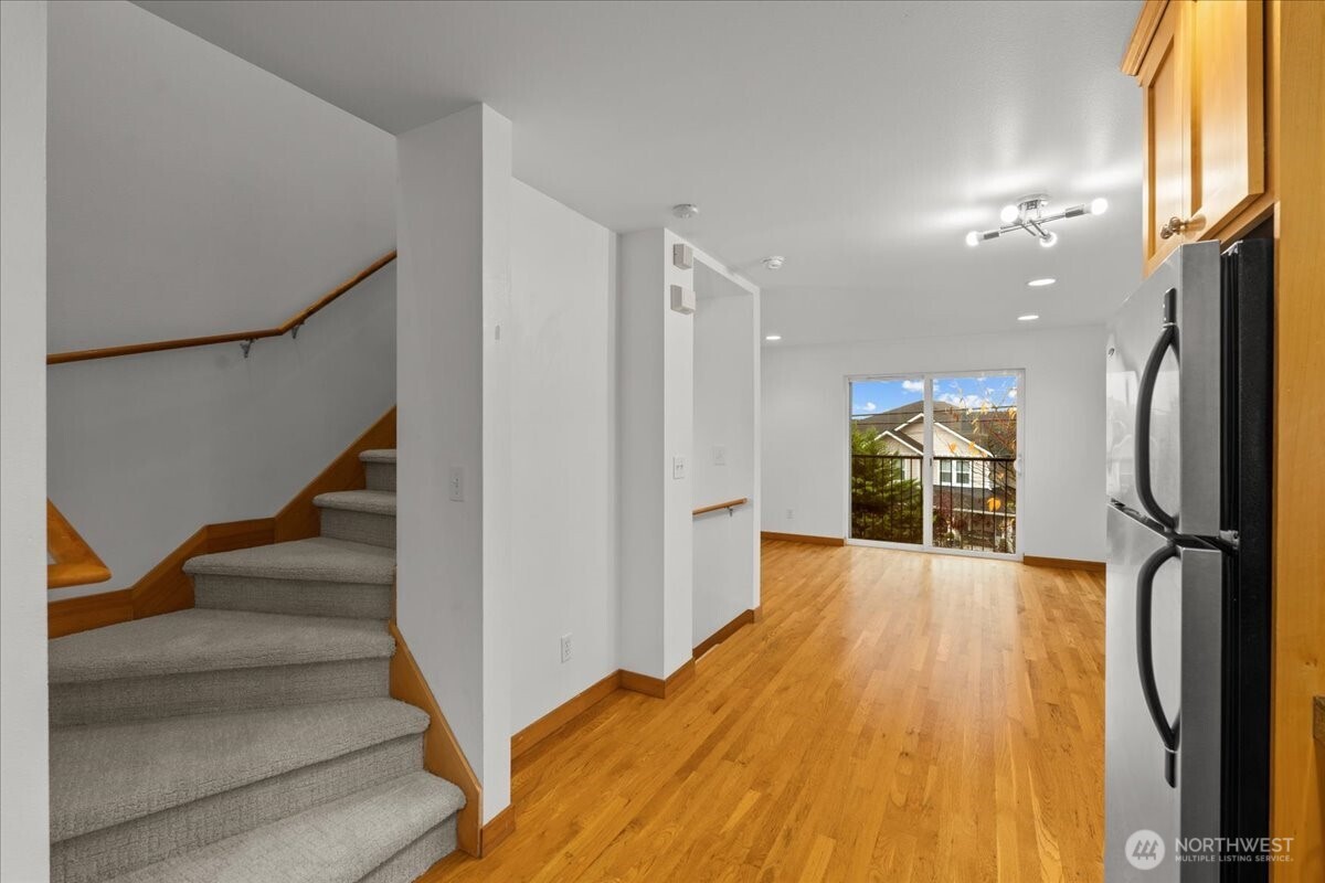 6348 34th Avenue Southwest, Unit C Seattle, WA 98126 - Photo 16 of 26 a view of entryway and hall with wooden floor