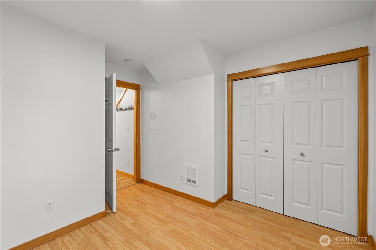 6348 34th Avenue Southwest, Unit C Seattle, WA 98126 - Photo 7 of 26 a view of an empty room