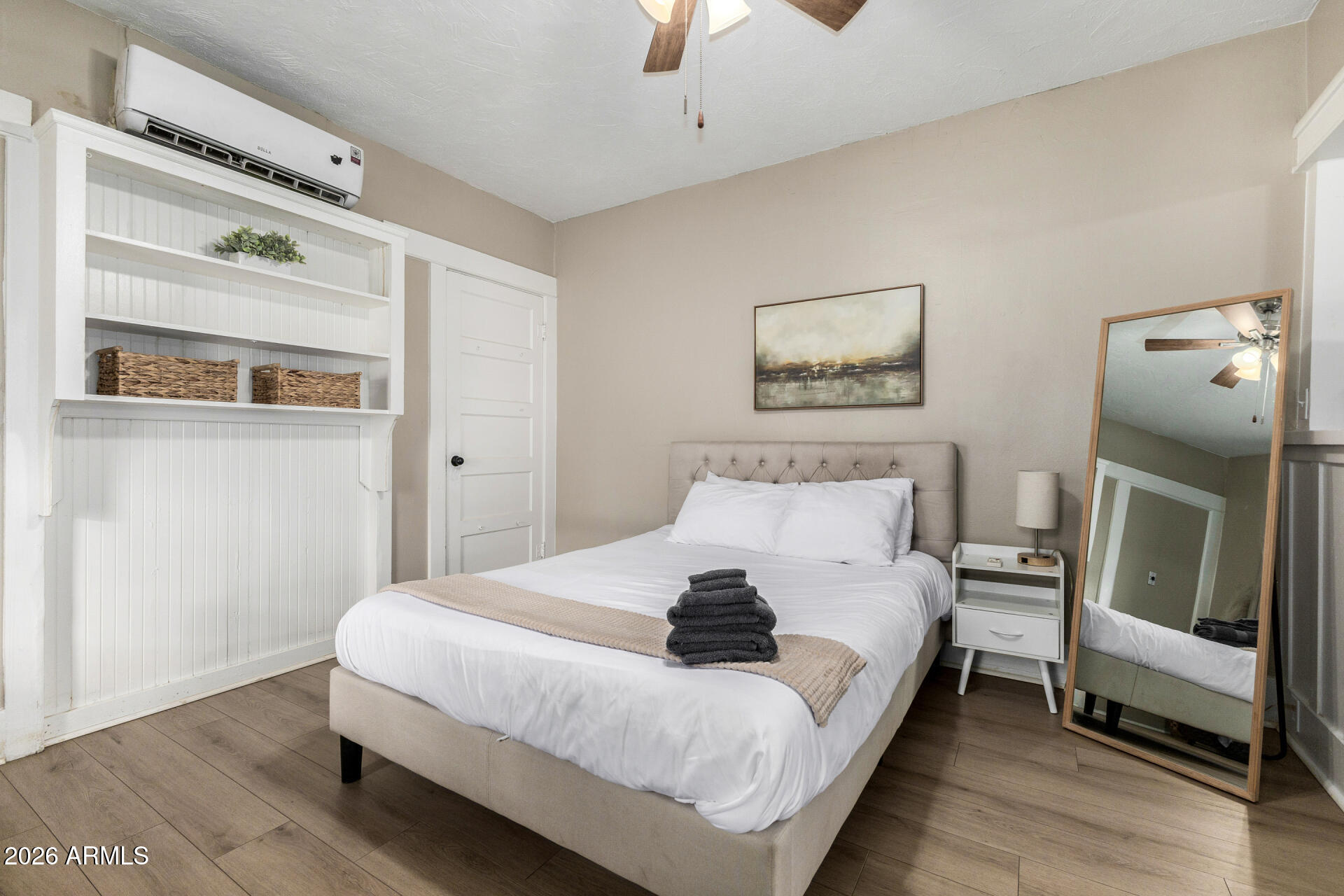 1317 West Monroe Street Phoenix, AZ 85007 - Photo 37 of 86 a bedroom with a bed and a fireplace