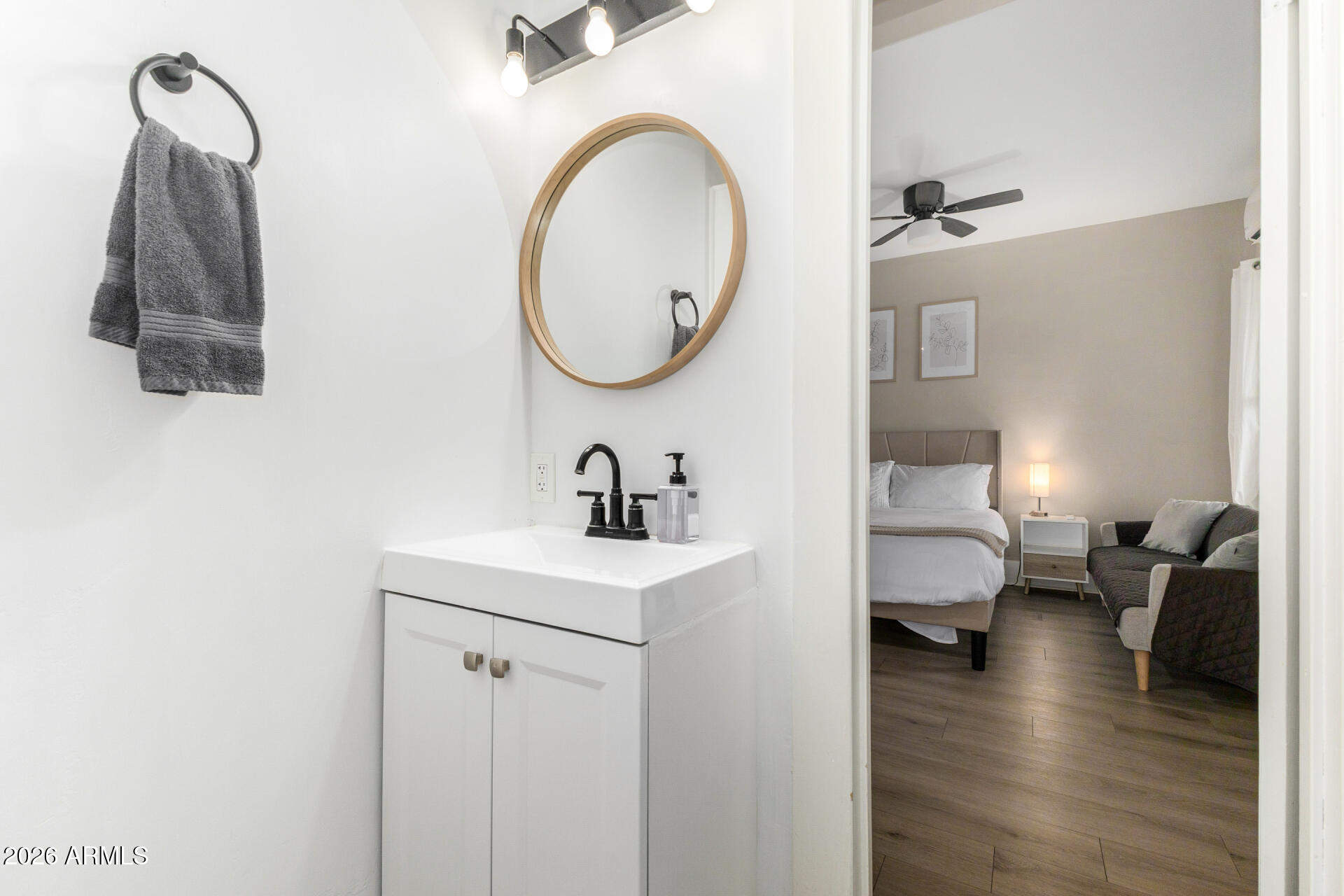 1317 West Monroe Street Phoenix, AZ 85007 - Photo 47 of 86 a en suite bathroom with a sink and a mirror