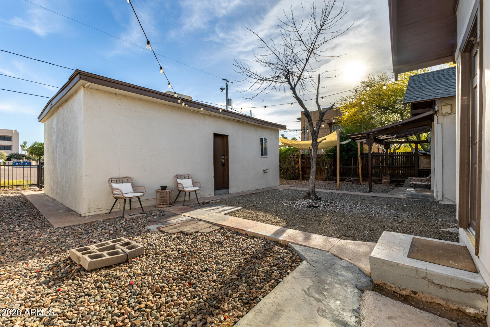 1317 West Monroe Street Phoenix, AZ 85007 - Photo 71 of 86 a backyard of a house with yard and outdoor seating