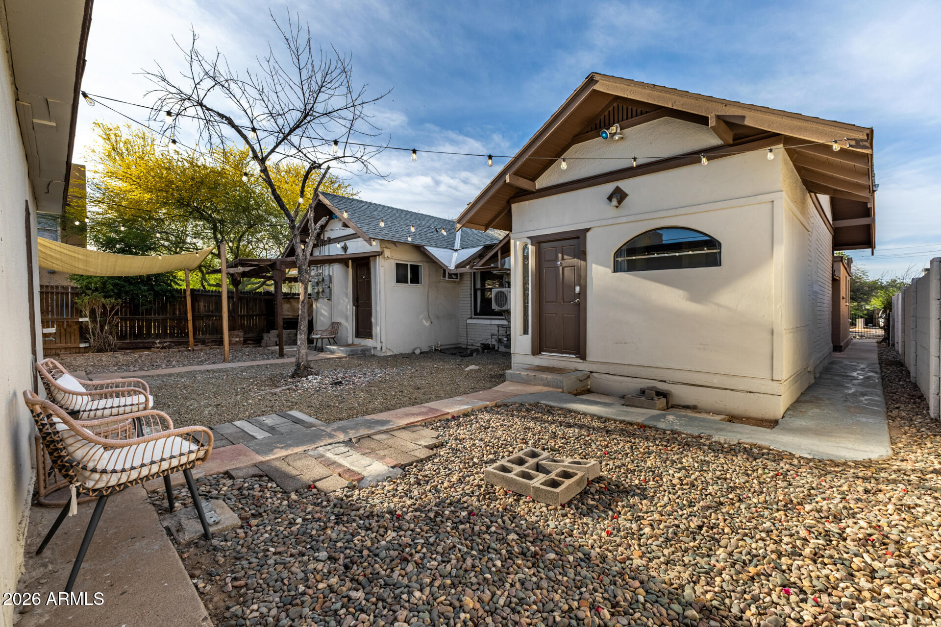 1317 West Monroe Street Phoenix, AZ 85007 - Photo 75 of 86 a front view of a house with garden