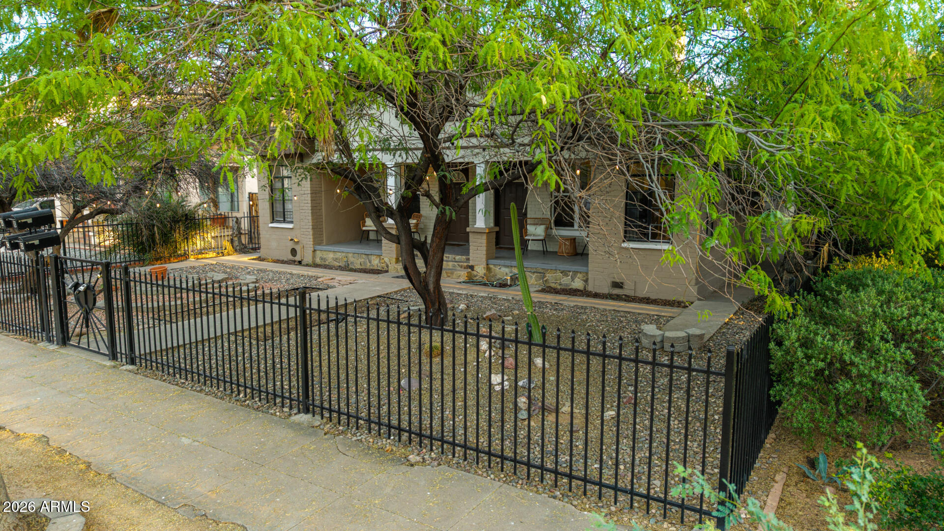 1317 West Monroe Street Phoenix, AZ 85007 - Photo 78 of 86 a view of a wrought iron fences in front of house